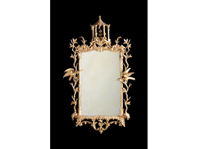 A pair of Rococo style giltwood mirrors second half of the 19th century,