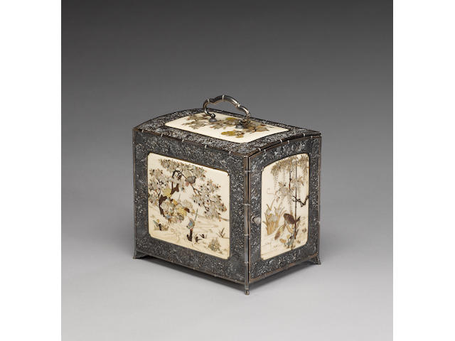 An elegant white metal Kodansu with hinged door