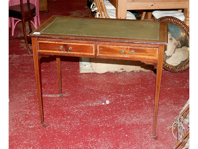 An Edwardian mahogany writing table