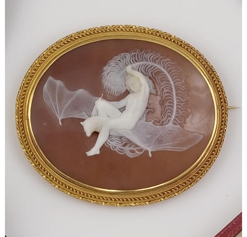 An oval shell cameo brooch