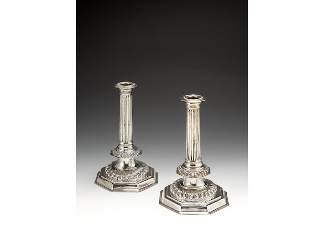 A pair of William III silver candlesticks, by John Barnard I,  London 1698,