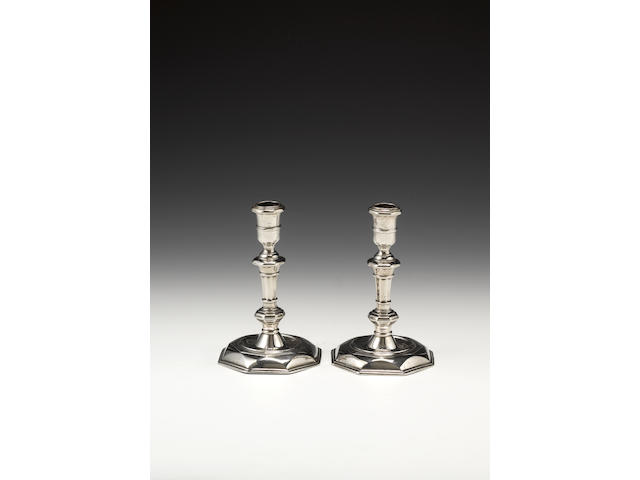 A pair of George II Irish silver candlesticks, maker's mark overstruck with another, "PG" in an oval punch, possibly that of Peter Gervais,  Dublin 1727,