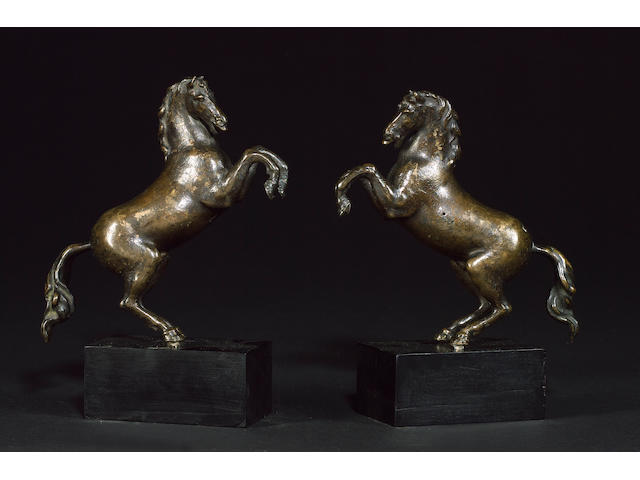 Studio of Francesco Fanelli (Italian, 1577-After 1641): A pair of 17th century bronze models of horses