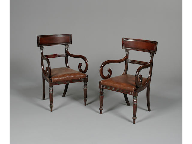 A set of twelve William IV mahogany dining chairs