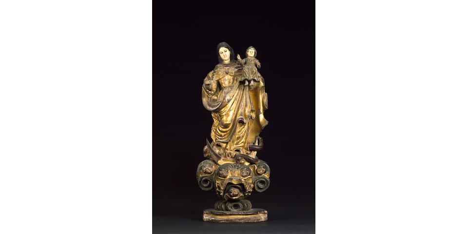 A rare 18th century Goanese / Phillipine giltwood, polychrome decoration and ivory figure of the Madonna and Child