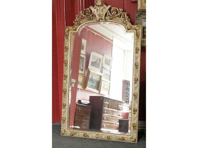 A gilt framed arched top mirror