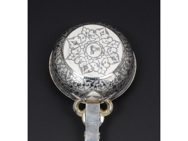 A 19th century Southern Russian silver and niello work ladle, maker's mark Arabic script initials, unidentified, Tbilissi, 1869,