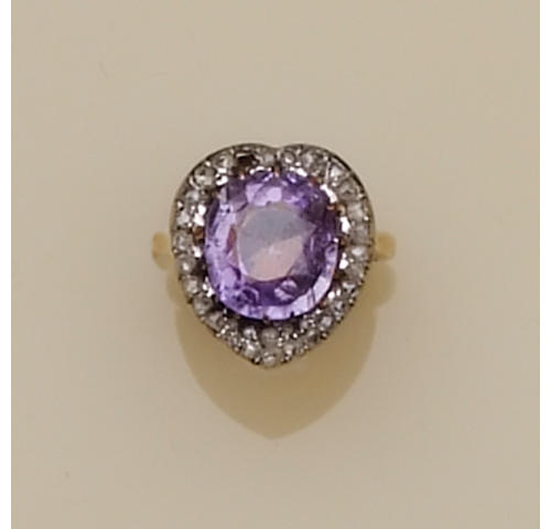 A purple sapphire and diamond cluster ring
