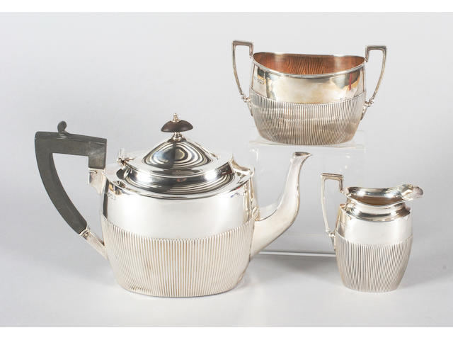A late Victorian silver three piece tea set By J Dixon and Sons, Sheffield, 1899,  (3)