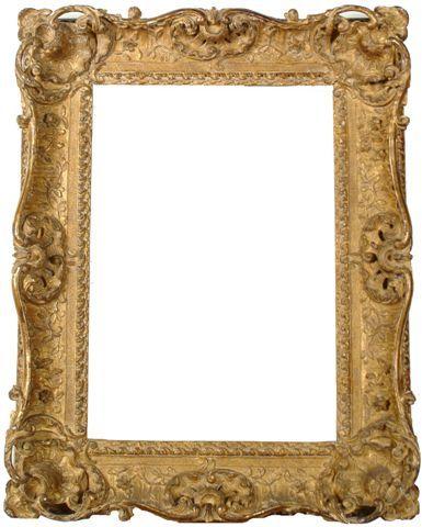 A Louis XIV style carved frame