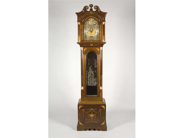 An early 20th century mahogany and marquetry quarter chiming longcase clock Vokes, Bath