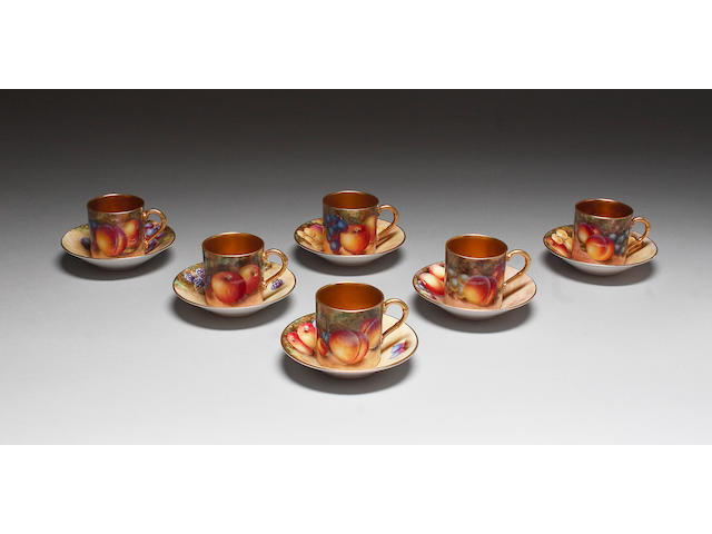 Six Royal Worcester coffee cans and saucers,