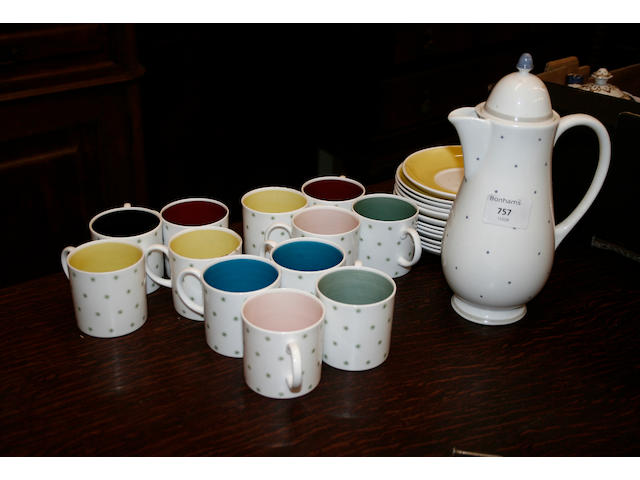 A Susie Cooper part coffee service decorated with green printed star pattern on a white ground