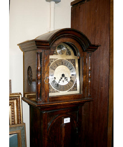 A dwarf longcase clock