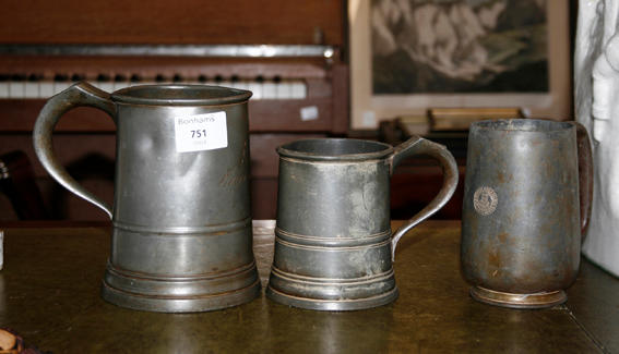 A set of three 19th century graduated pewter measures,