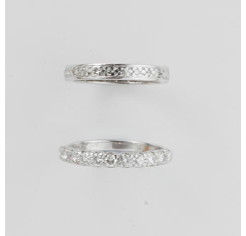 A diamond half eternity ring and a diamond full eternity ring, (2)