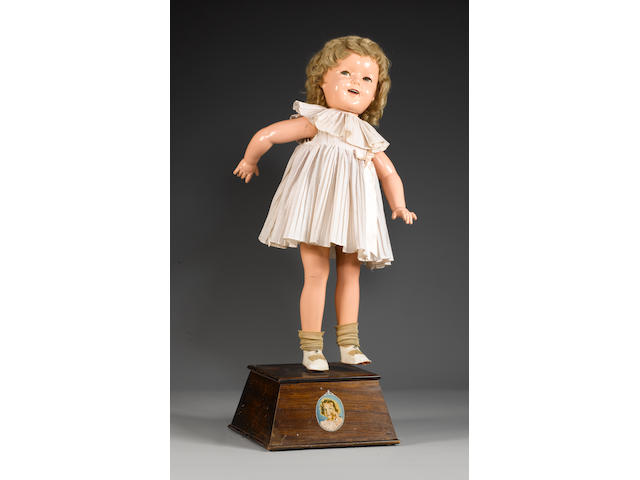 A very rare Shirley Temple mechanical shop display doll, circa 1935