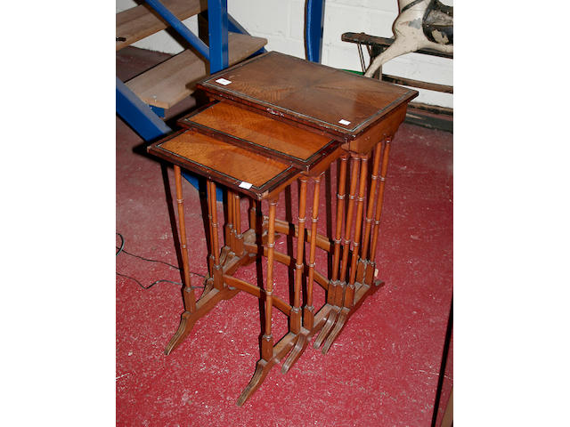 An Edwardian ebony line inlaid and banded satinwood quartetto of tables
