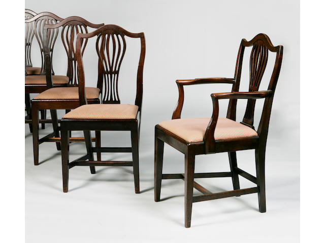 A set of nine George III style dining chairs