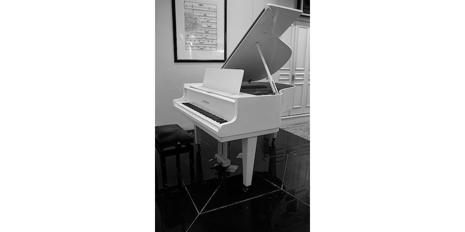 A 5ft 4in Model 160 grand piano