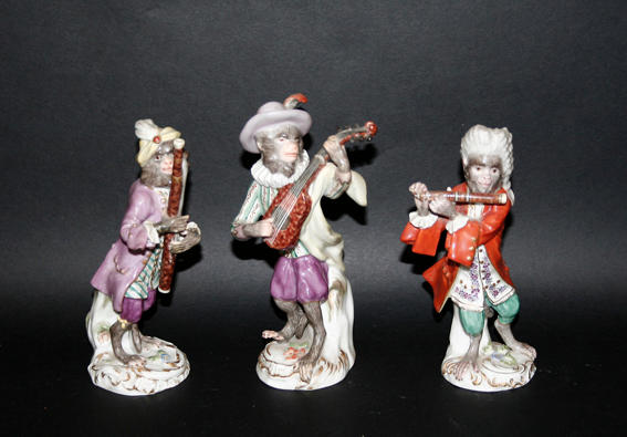 Three late Meissen monkey bandsmen