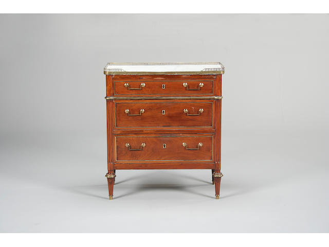 A French Directoire mahogany and brass commode of small proportions