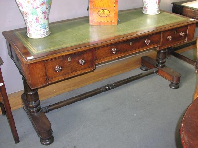 A William IV mahogany and rosewood library table,
