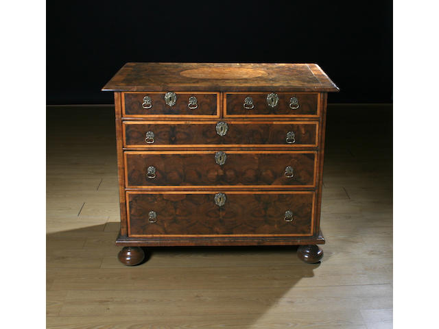 A late 17th Century oyster veneered chest of drawers