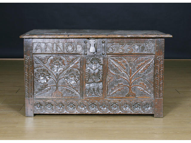 An early 17th Century oak coffer, circa 1633