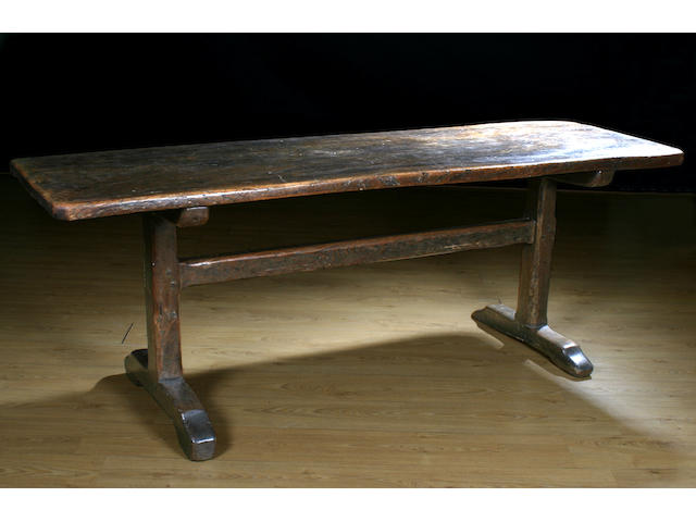 A late 18th Century elm trestle table