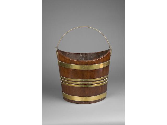 A George III brass bound mahogany peat bucket,