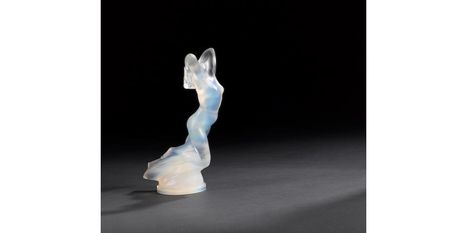 A fine and rare 'Vitesse' opalescent glass mascot by Ren&#233; Lalique, introduced 17 September 1929,