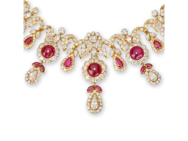 A ruby and diamond necklace, brooch and pair of earrings (3)