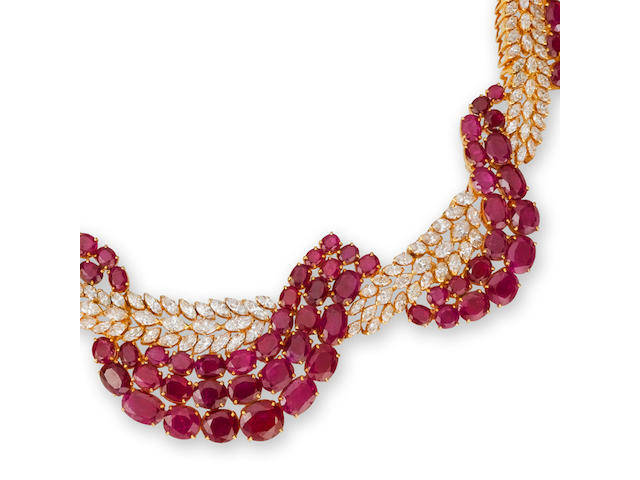 A ruby and diamond necklace, bracelet and ring suite (3)