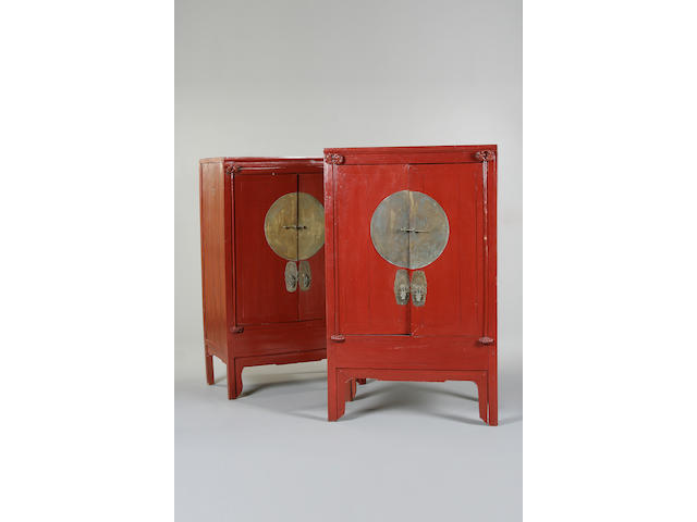 A matched pair of Chinese red painted cabinets,