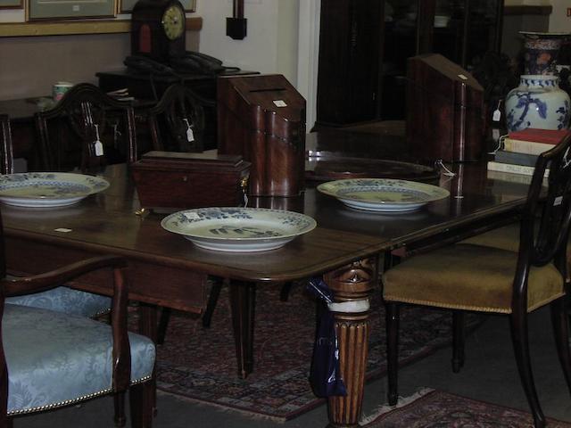 A William IV or early Victorian mahogany dining table
