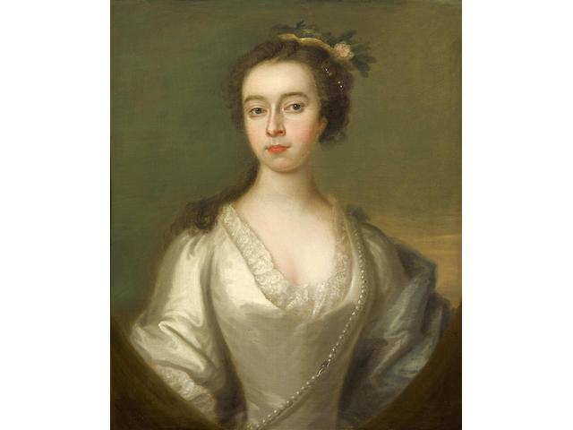 Charles Philips (British, 1708-1747) Portrait of a lady, half length, wearing white satin dress and blue cape draped across her shoulders within painted oval,