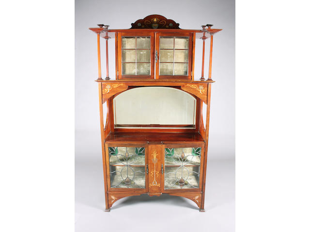 An Art Nouveau inlaid mahogany display cabinet