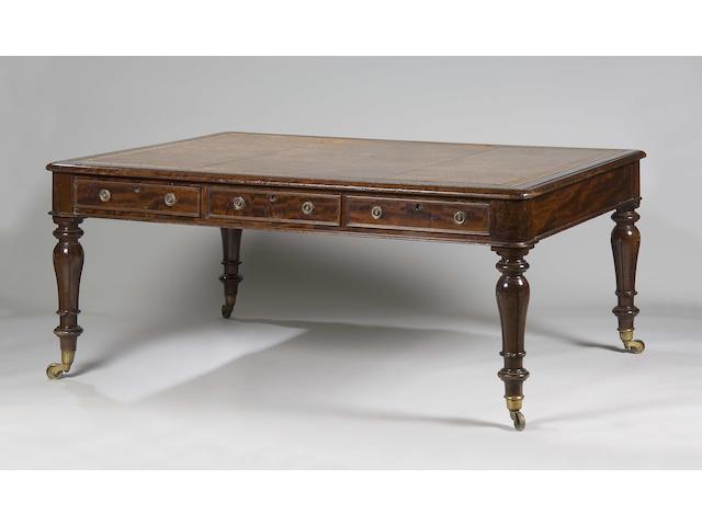 A George IV mahogany partners library table