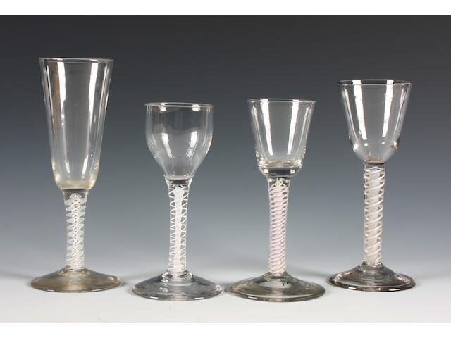 Four opaque-twist wine glasses
