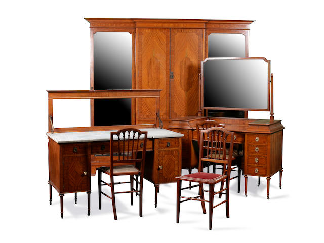 An Edwardian satinwood and inlaid six-piece bedroom suite