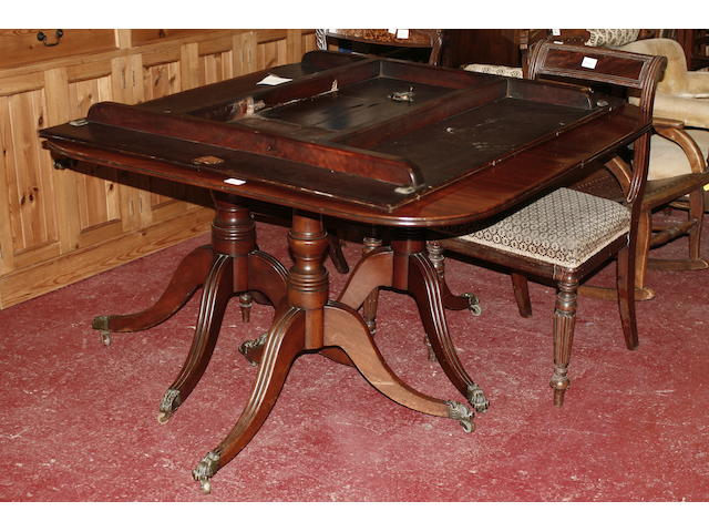 A mahogany triple pillar dining table 19th century and later,