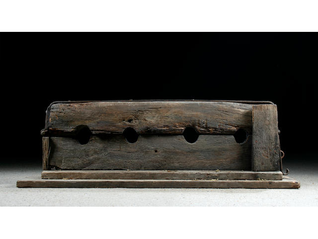 A rare set of iron-bound village stocks Probably late Medieval