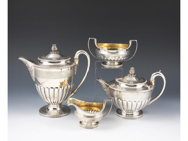A George III silver four piece tea set The teapot and hot water pot with maker's mark for Peter and William Bateman, London, 1806, the sugar bowl and cream jug also, London, 1806 but maker's mark indistinct,  (4)