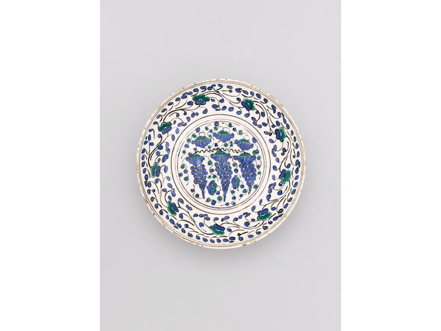A fine Iznik pottery "Grape Dish" Turkey, circa 1550