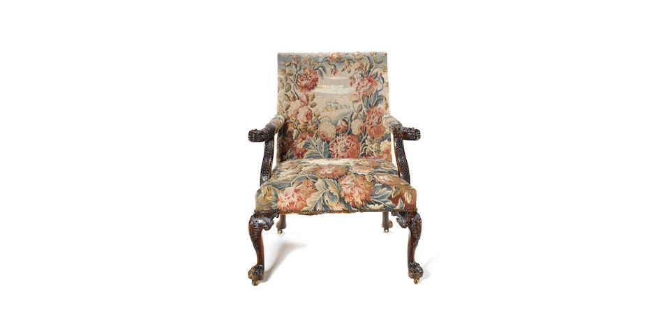 A fine George II carved mahogany Library Open Armchairin the manner of Giles Grendey