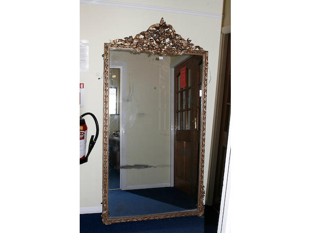 A mid 19th century gilt wood over mantle mirror