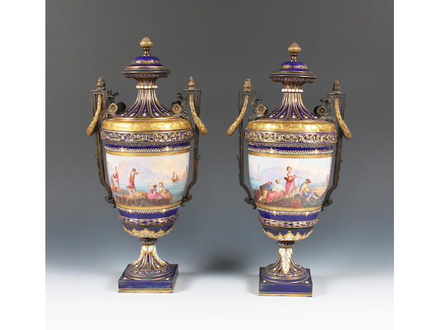 A pair of S&#232;vres style vases and covers with ormolu mounts