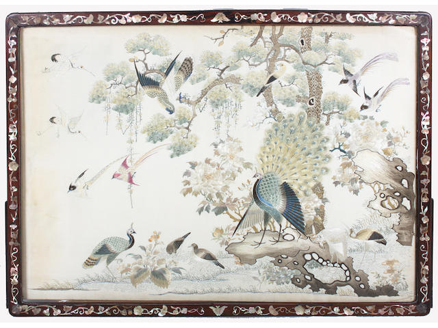 A Japanese inlaid hardwood screen enclosing an embroidered silk picture