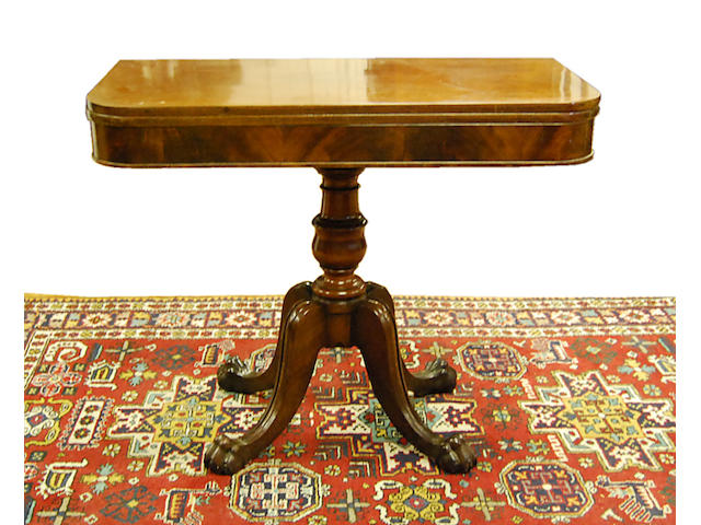 A William IV mahogany fold-over tea table